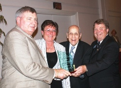 John A. Logan College trustee Jake Rendleman (left) receives ICCTA's 2010 Ray Hartstein Trustee Achievement Award from ICCTA president Barbara Oilschlager, ICCTA Honorary Member Ray Hartstein (left) and ICCTA vice president David Harby.