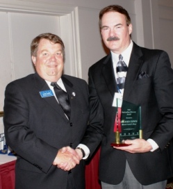 Dr. John Erwin (right) accepts ICCTA's 2010 Advocacy Award from ICCTA vice president David Harby.