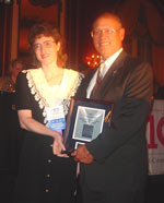 Lynette Gage (left) accepts her Pacesetter Award from ICCTA past president Linden Warfel.