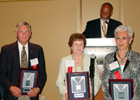 Former Harper trustees Dr. Richard Kolze, Kris Howard, and Barbara Barton accept their ICCTA Certificates of Merit.