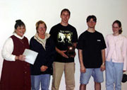 Coach Helen Krause (left) shares the 3rd-place spotlight with the Illinois Central College team.