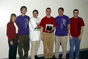 Coach Ann Marie Barry (left) and Oakton's College Bowl team celebrate their 2nd place win.