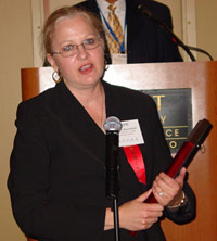 Patti Wojcikowski accepts her ICCTA Certificate of Merit.